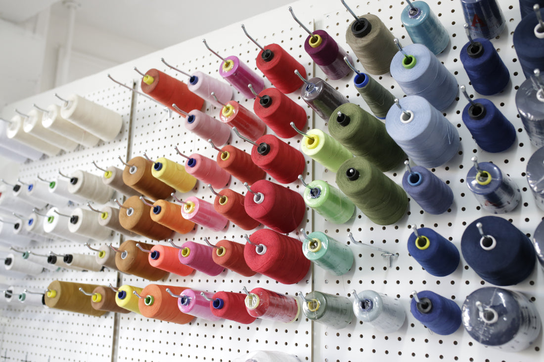 Colorful thread cones on the VIKTR MARTIN studio wall