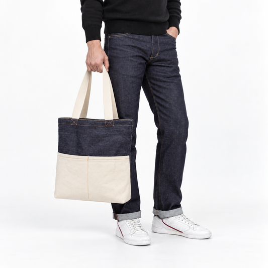 Biggie Denim Tote Bag — With Pockets — model view on a white studio background