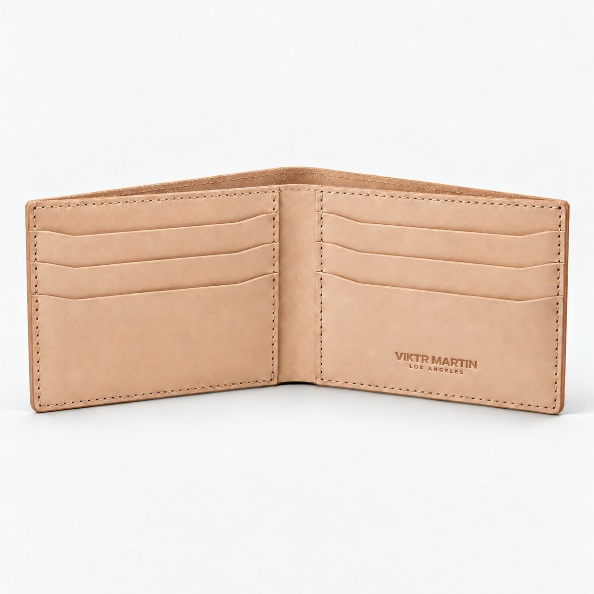 Trazo Leather Bifold Wallet - Natural — natural leather with VIKTR MARTIN LOS ANGELES wordmark, approximately 1.25 inches wide; illustrative development sample.