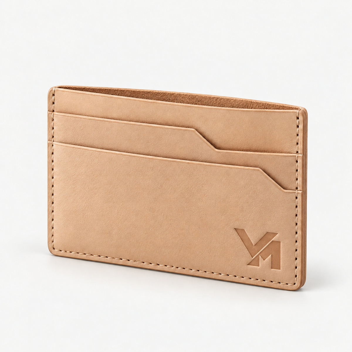 Trazo Leather Cardholder - Natural — natural leather with VM monogram, approximately 0.75 inch wide; illustrative development sample.