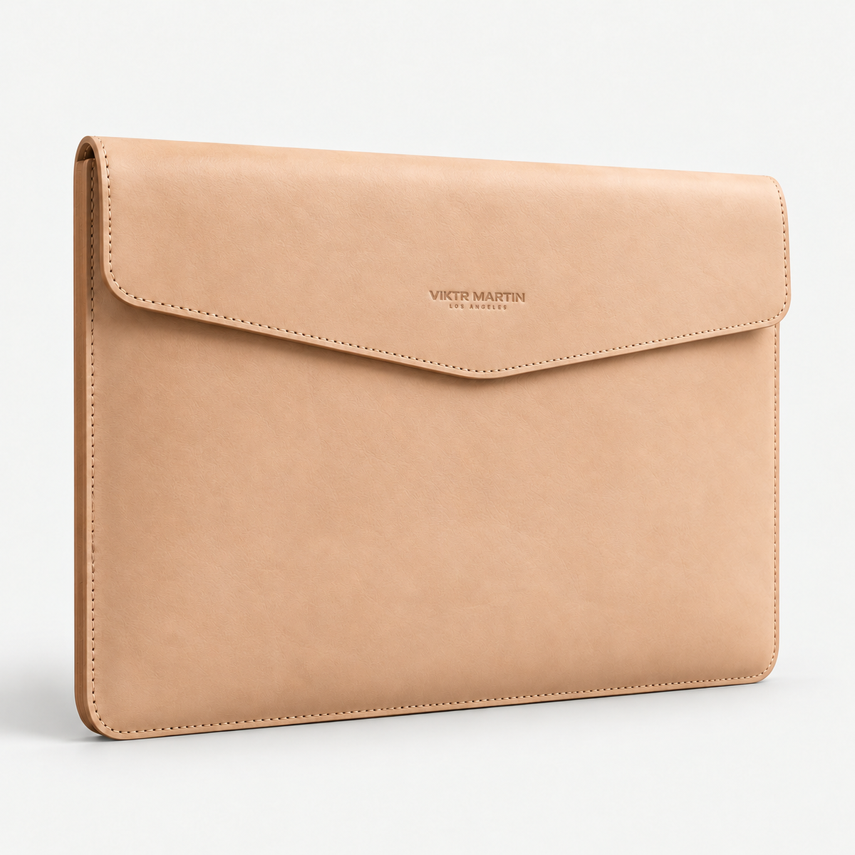 Margen Leather Laptop Sleeve - Natural — natural leather with VIKTR MARTIN LOS ANGELES wordmark, approximately 1.25 inches wide; illustrative development sample.