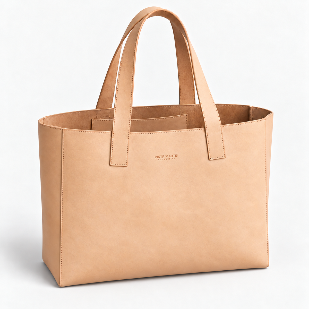 Pilar Leather Tote - Natural — natural leather with VIKTR MARTIN LOS ANGELES wordmark, approximately 1.25 inches wide; illustrative development sample.